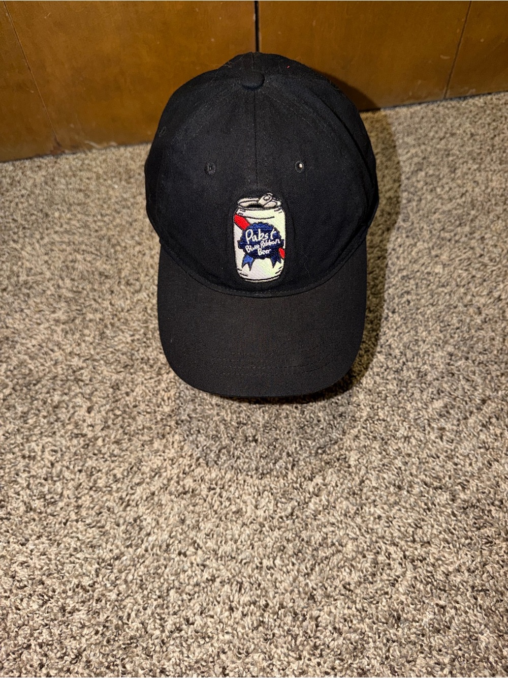 Black Baseball Cap with Embroidered Can Patch